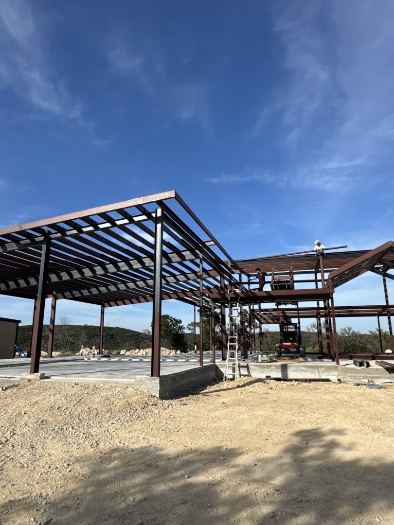 Steel erection in progress showing structural framing, Central Texas